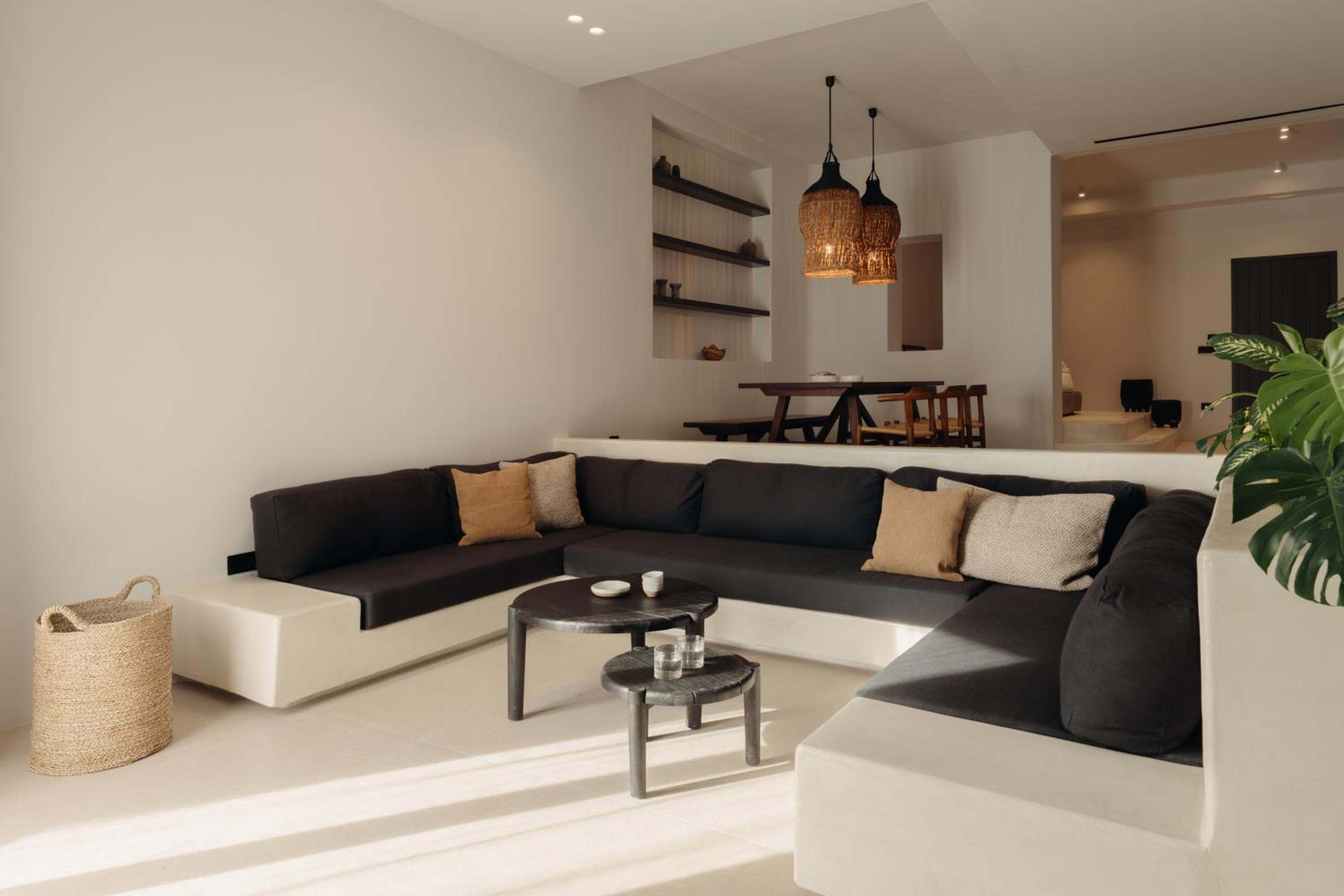 Del Sol Suite: built-in living-room seating with cushions and low tables