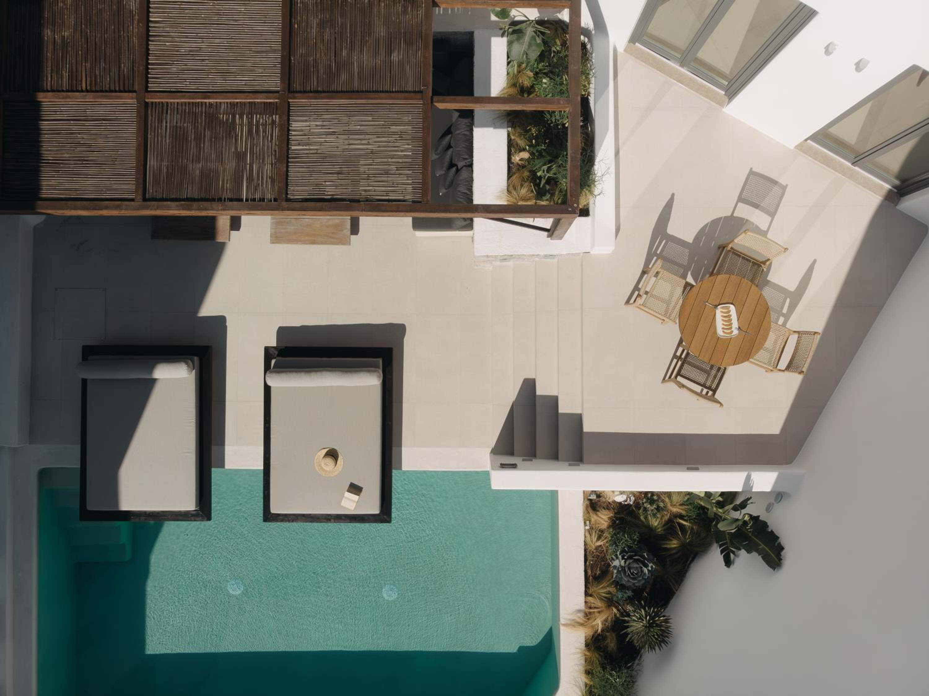 Del Sol Suite from above: the private pool, daybeds and a dining terrace