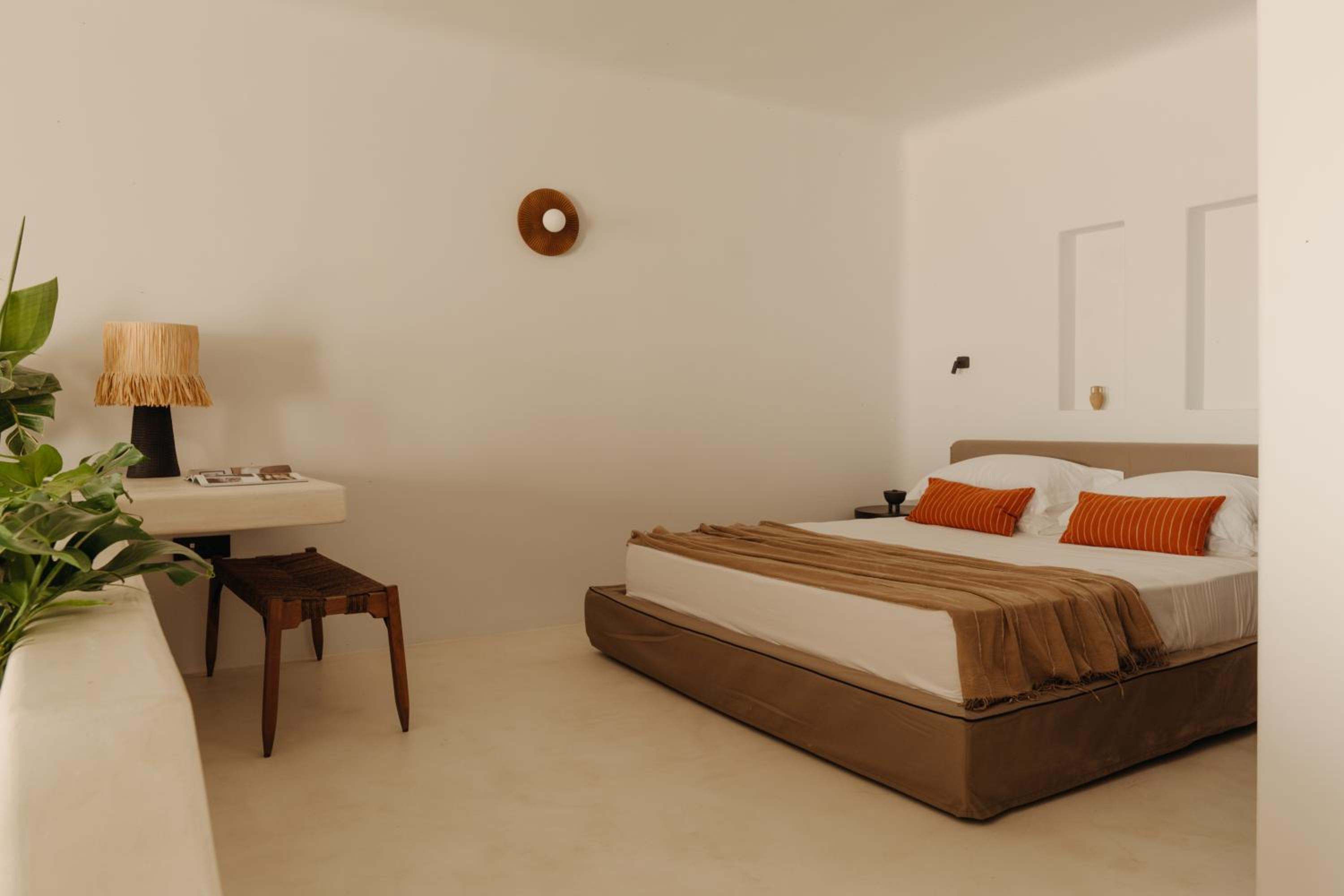 Premier Suite: the bedroom, with a double bed and a writing desk