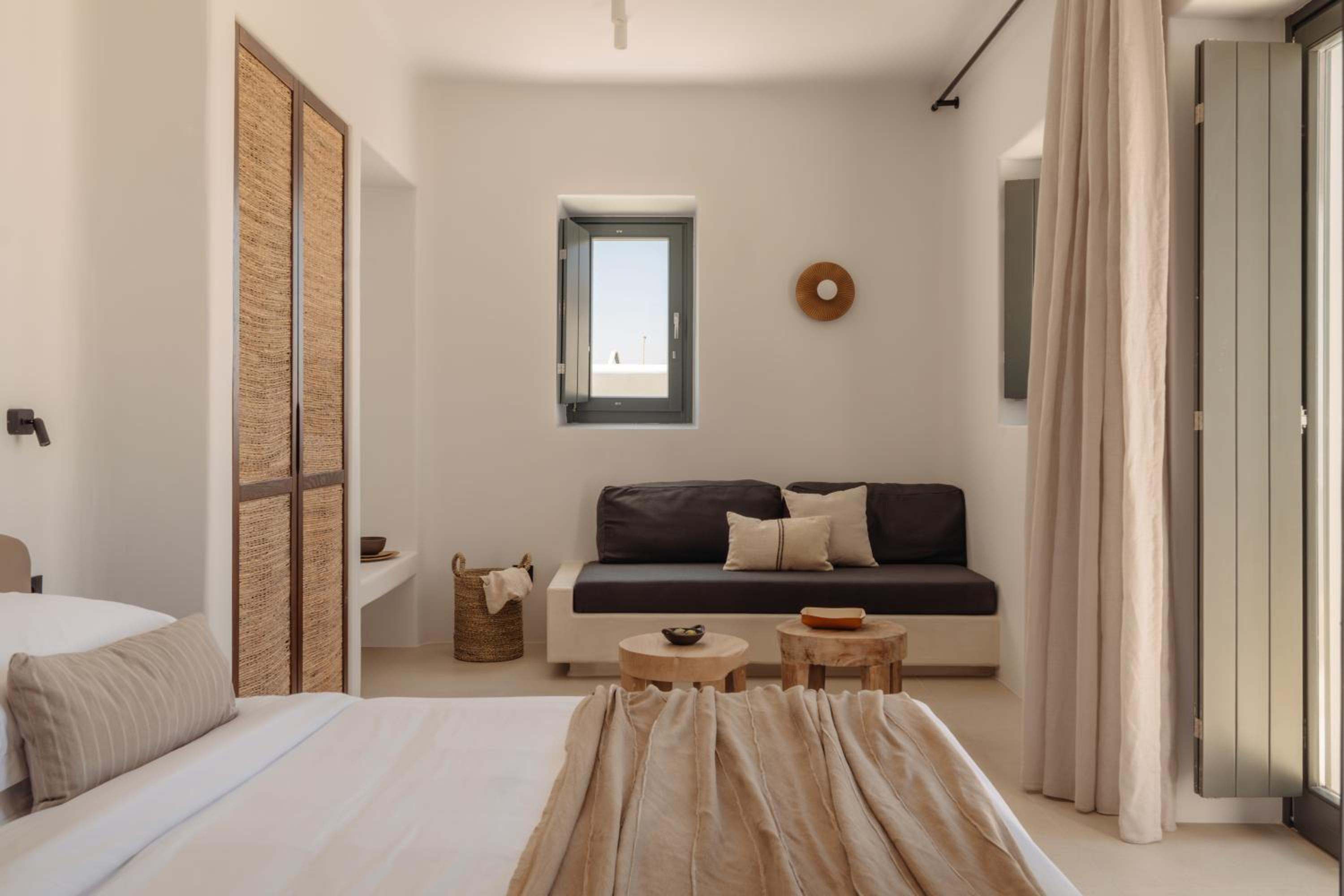 Junior Suite with Outdoor Hot Tub: the room from the bed towards a sofa