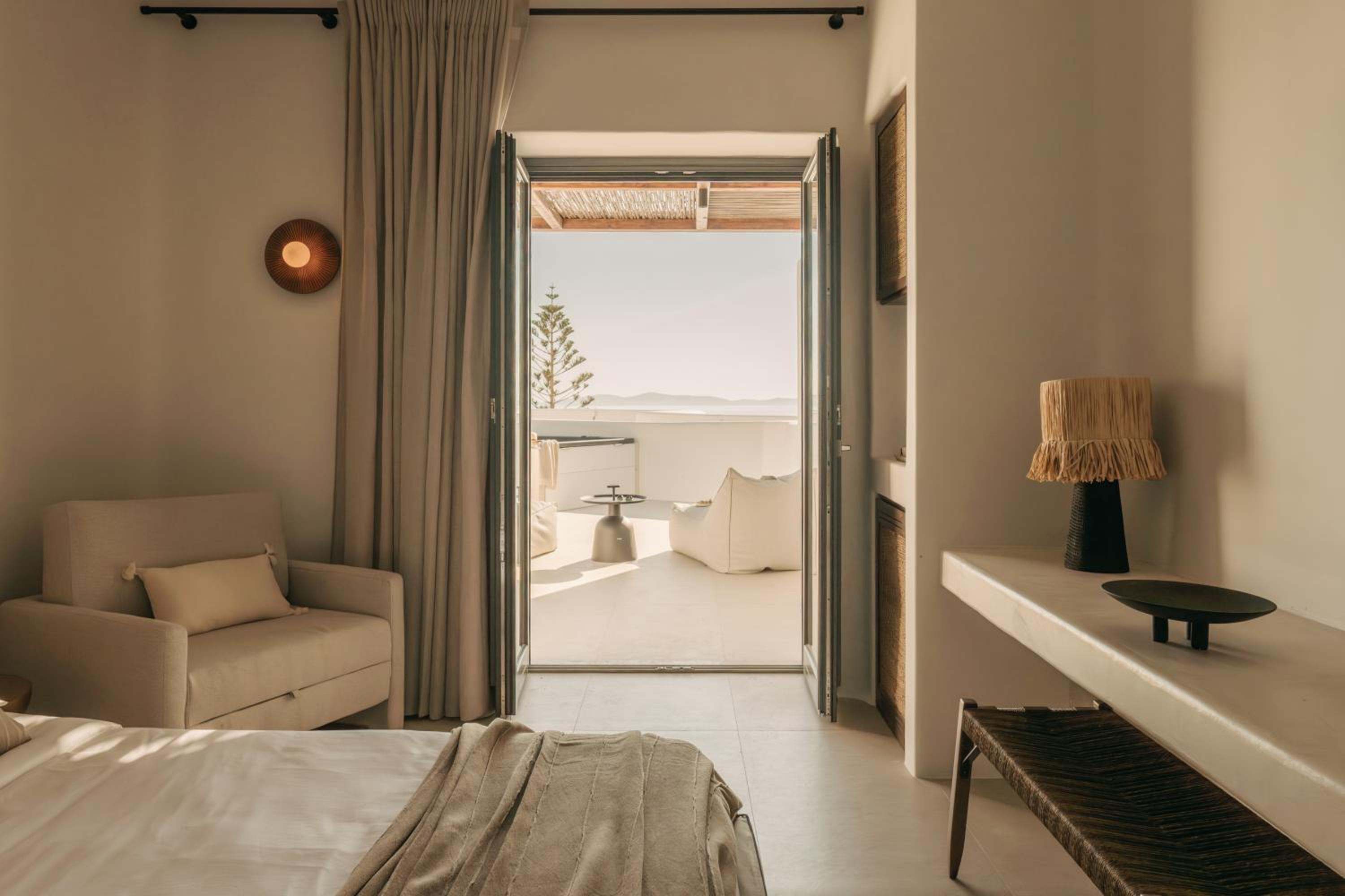 Junior Suite with Outdoor Hot Tub: open doors from the room onto the terrace