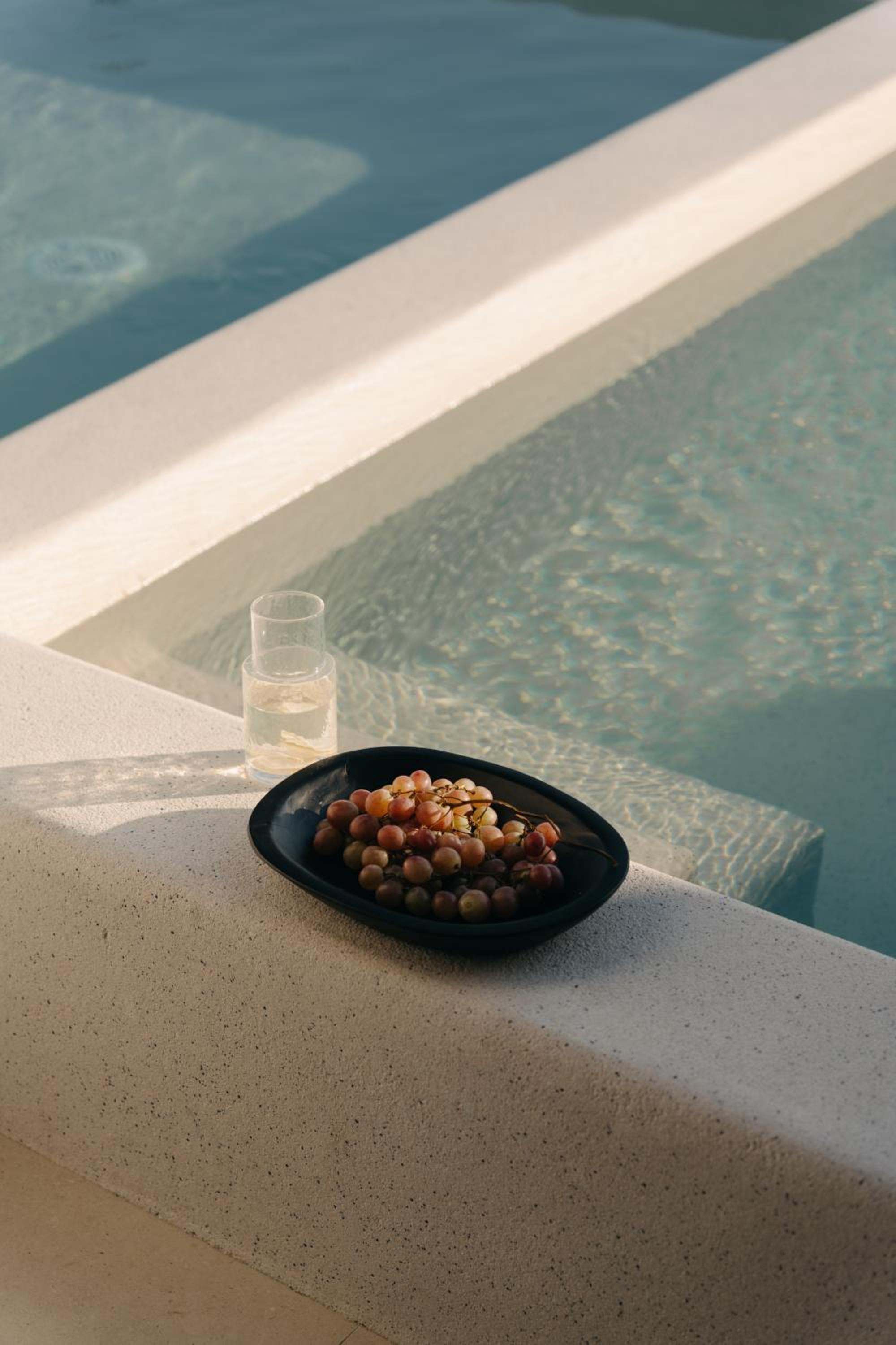 Junior Suite with Private Pool: a dish of grapes on the pool edge